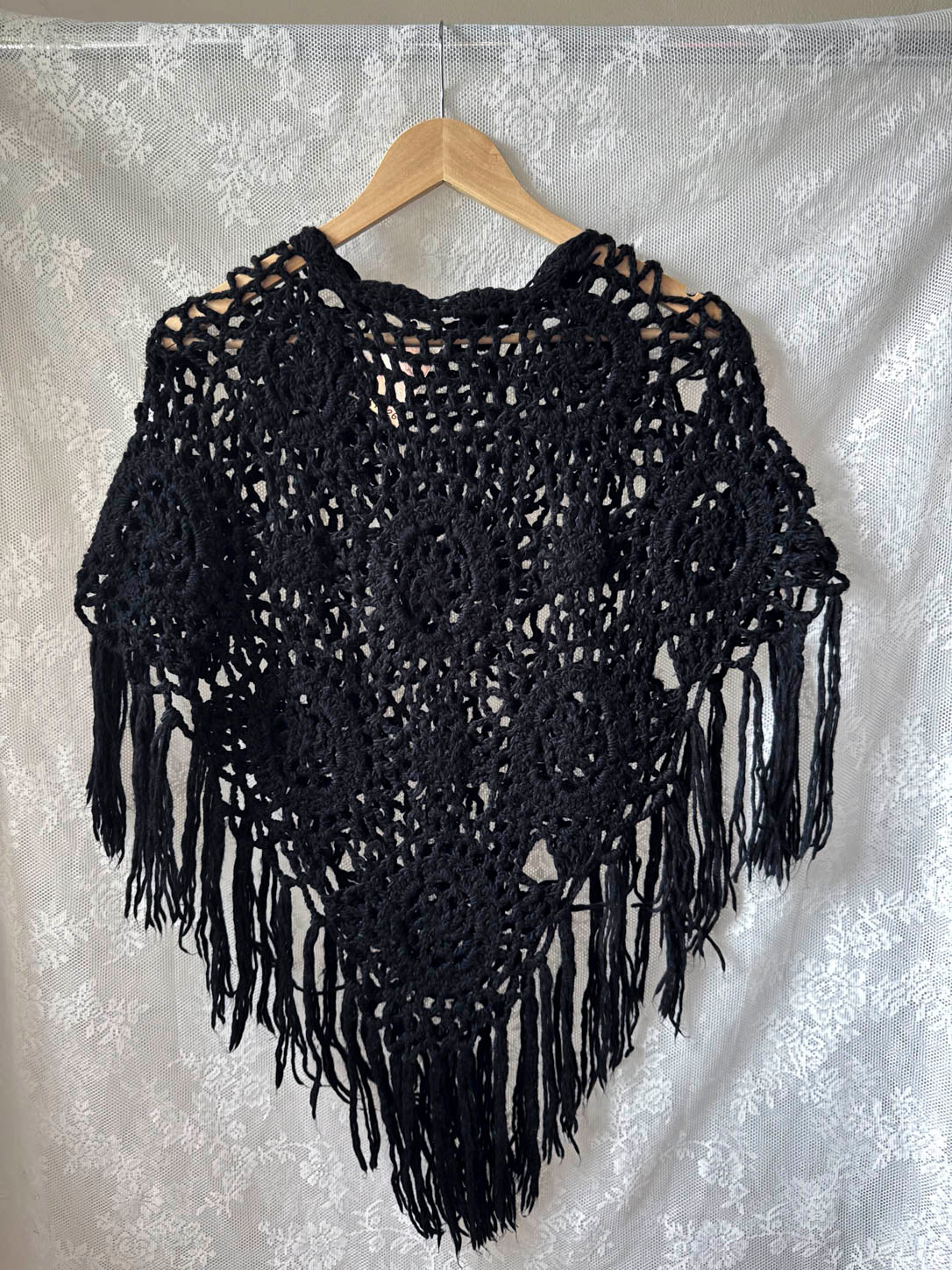 Sort poncho