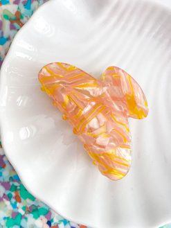 orange og lyserød marmoreret hårklemme fra sistie