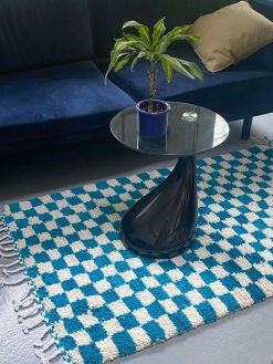 checkered rug with blue and white checkered. The rug is hand-woven in 100% wool in Morocco.