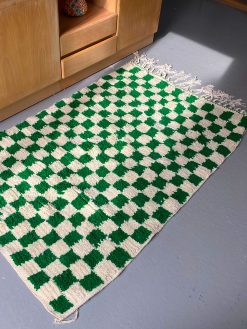 chequered rug in the softest wool with white and green checks.