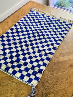 checkered rug in the softest wool with white and cobalt checks.