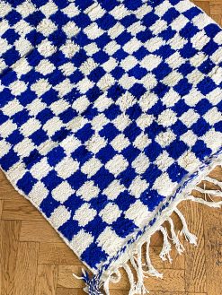 checkered rug in the softest wool with white and cobalt blue checks.